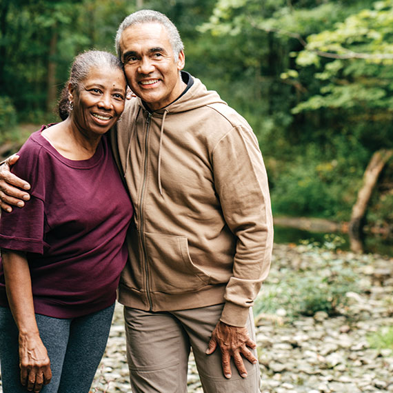 A couple smiling. Links to Gifts by Estate Note estate.jpg
